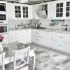 Modern white kitchen with dining area